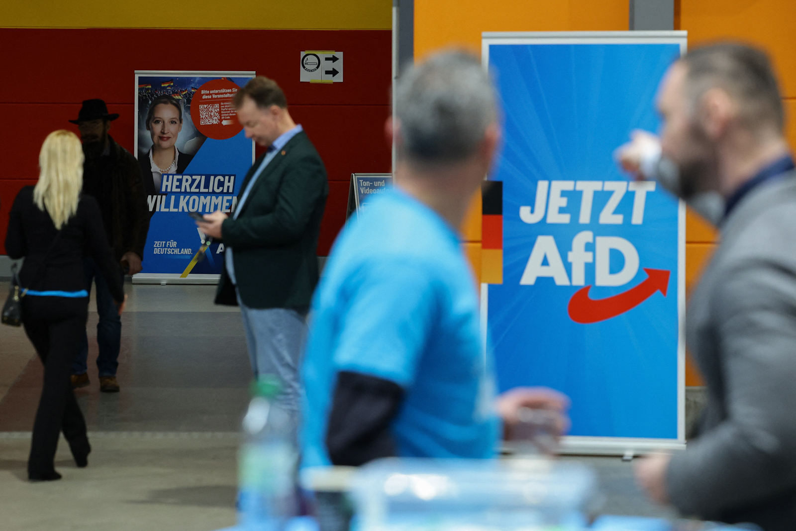 Supporters of Alice Weidel, co-leader of Germany's far-right Alternative for Germany (AfD) party, wait for her to address an election campaign rally on January 25, 2025 in Halle, eastern Germany. (Photo by AFP) (Photo by -/AFP via Getty Images)